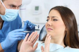 Scared patient in a dentist office